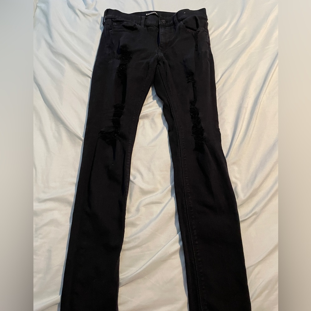 Mid rise black ripped jeans
